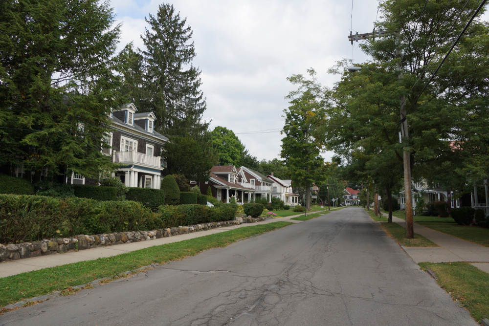 Street view of residential properties in Oneonta, New York.